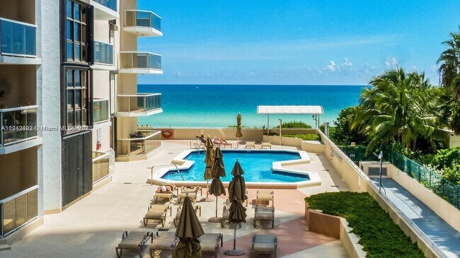 Building Photo - 6423 Collins Ave