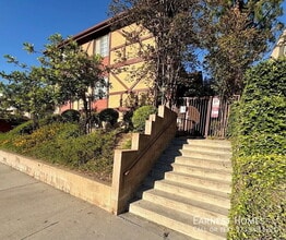 Building Photo - 10220 De Soto Ave