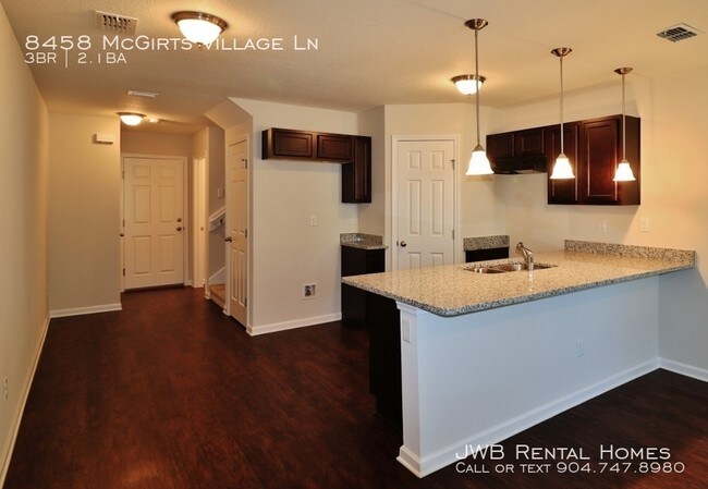 Building Photo - 8458 McGirts Village Ln