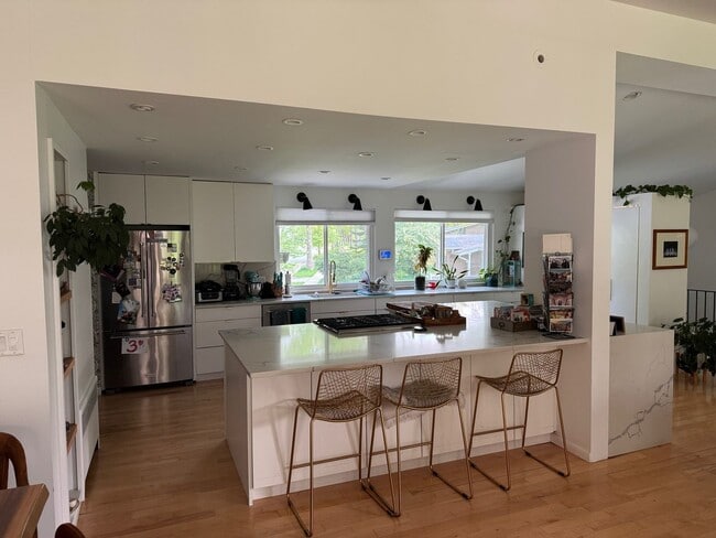 Photo - large modern home with big backyard, peace...