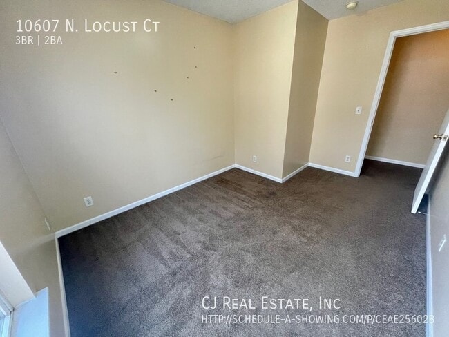 Foto del edificio - 10607 N Locust Ct