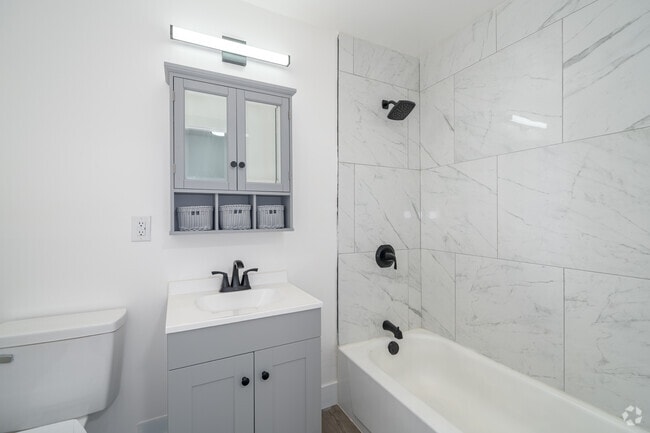 3BR, 1BA - 1,100SF - Bathroom - Riverside Apartments