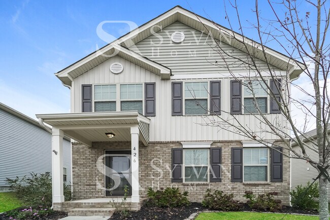 Foto del edificio - Come view this charming home