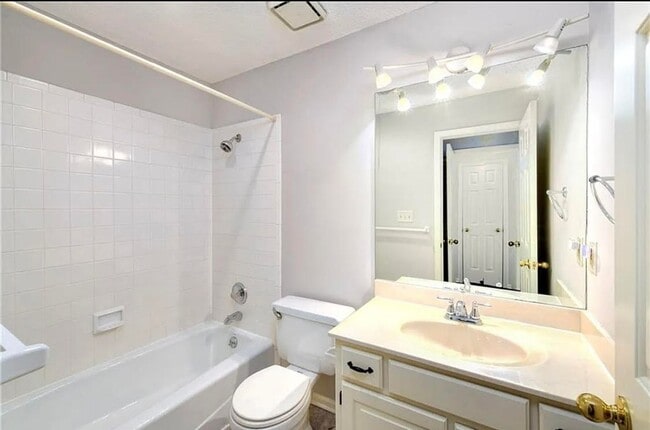 Building Photo - COMING SOON: Charming 2-Bedroom Condo in a...
