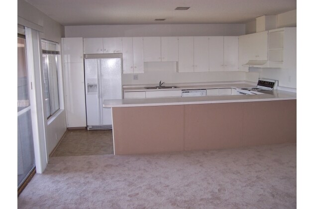 Kitchen and partial Living room - 39950 Bird Ln