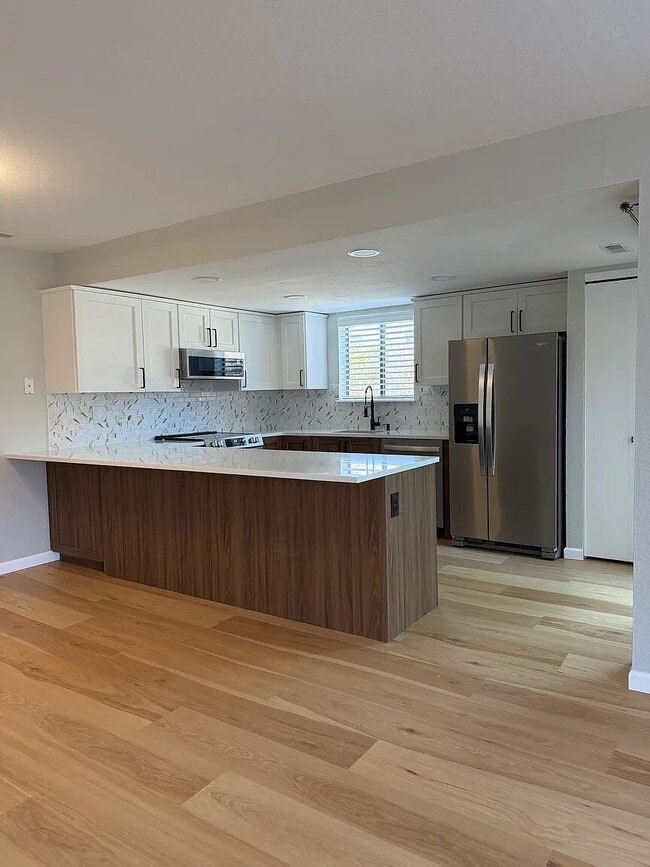 Building Photo - Newly Remodeled 1-Bed 1-Bath Townhome with Garage Parking – Available Now!