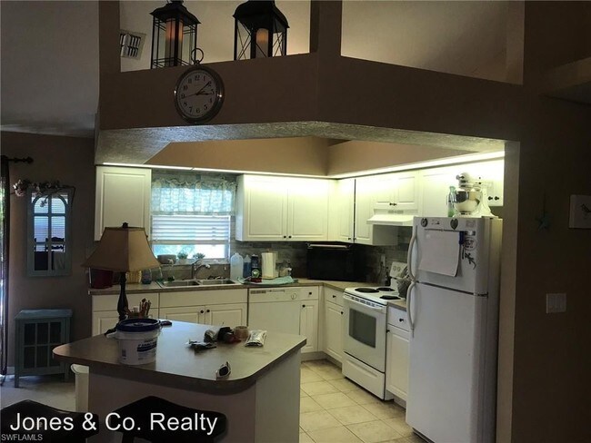 Foto del edificio - 4 br, 2 bath House - 904 NW Juanita Pl