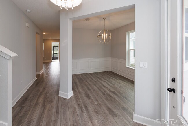 Entryway view toward back of house including dining area - 118 Andesite Trl