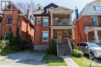 Building Photo - 132-132 Flora St