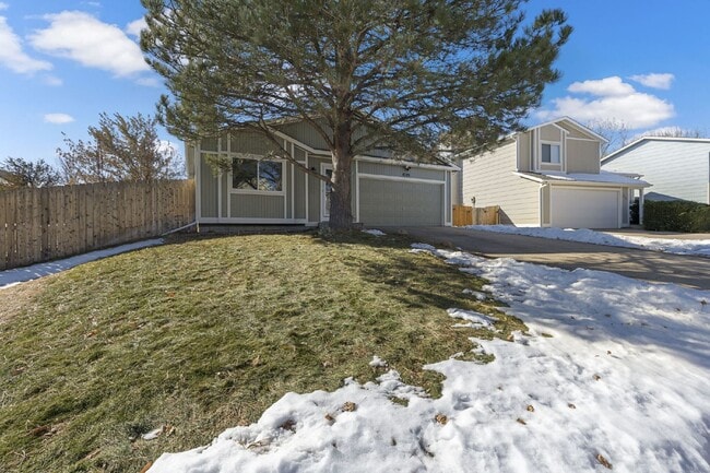 Photo - Spacious 4-Bedroom Home with Finished Basement, Large Deck & 2-Car Garage