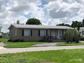 Building Photo - 6520 Sandalfoot Blvd