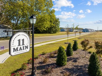 Building Photo - 11 @ Main Townhome Community