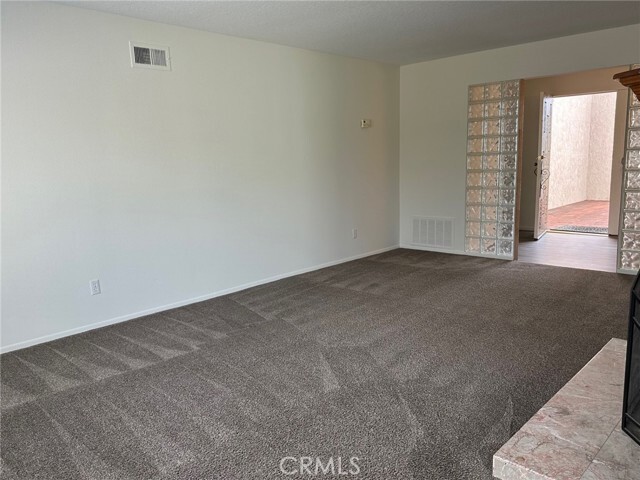Building Photo - 4181 Los Serranos Blvd