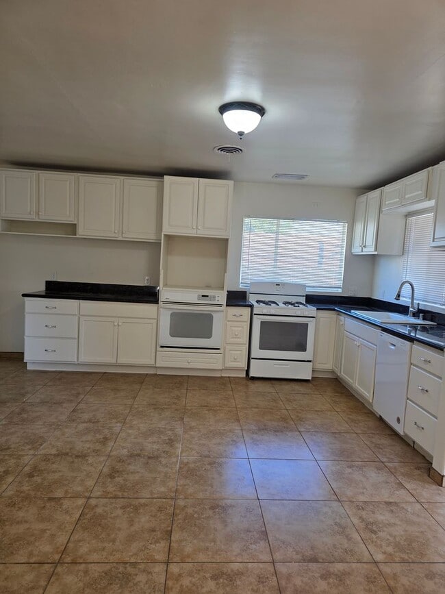 Building Photo - 230- 3988p -6210 &amp; 6212 Wright Ave. - AS