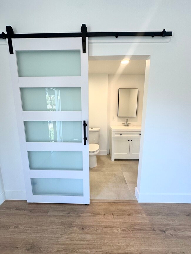 Sliding barn door to bathroom - 7080 Estrella de Mar Rd