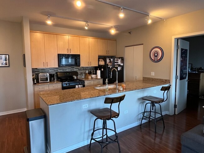 Huge island with plenty of counter space! - 330 W Grand Ave