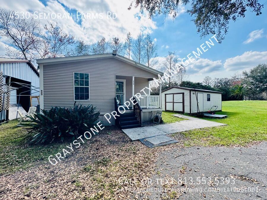 Primary Photo - Serene 2-Bedroom Home with Flowing Creek a...