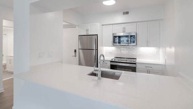 Kitchen with Stainless Steel Appliances - Water Park Towers