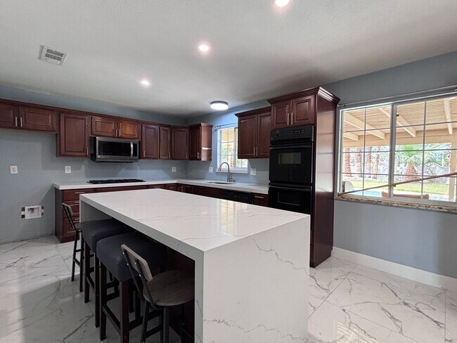 Building Photo - Spacious 4BR Single-Story with Pool, RV Parking & Large Lot Near Shopping & Dining