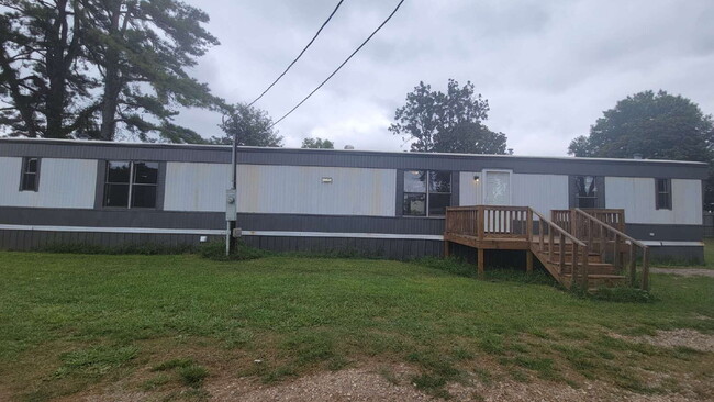 Building Photo - " 2-Bed, 2-Bath Mobile Home Retreat in Tan...