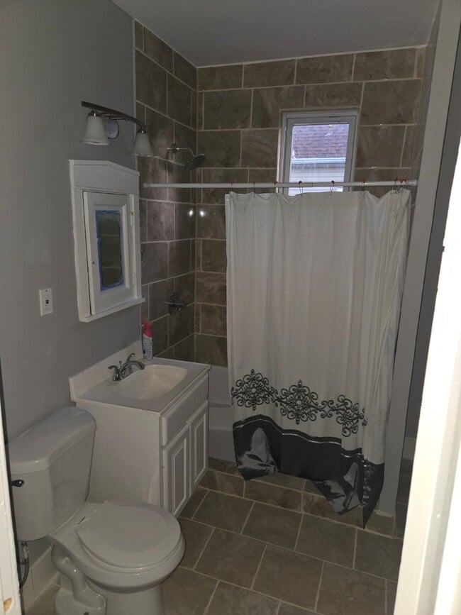 Building Photo - 8445 S Marquette Ave