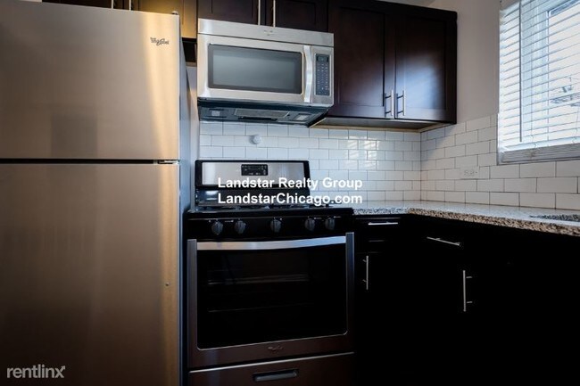 Building Photo - 2 br, 1 bath Apartment - 7551 N Bell Ave