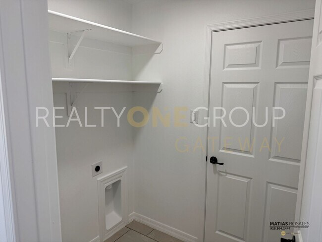 Building Photo - Three Bedroom Two Bath Home with All Tile ...