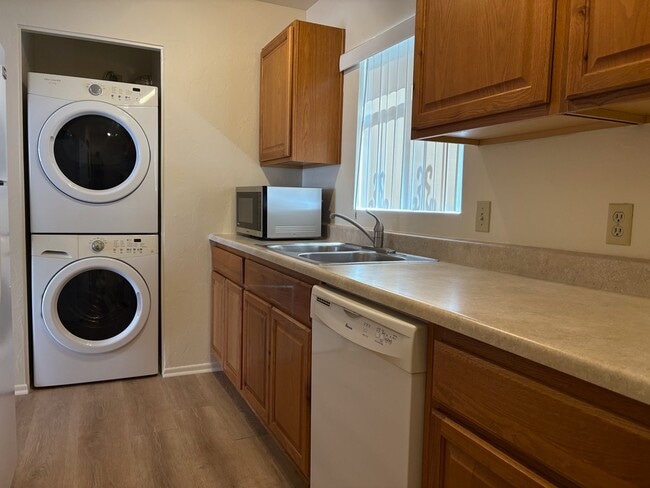 Kitchen, also showing washer and dryer - 706 E Linden St
