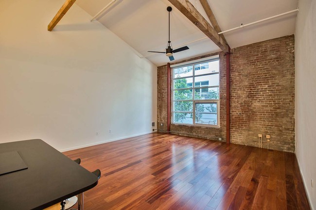 Building Photo - Top-Floor Brick and Timber Loft