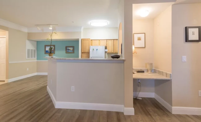 Kitchen and Desk (for any remote work!). The Kitchen overlooks the Living Room. - 3384 Corona Village Way