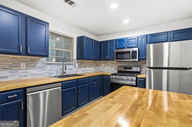 Foto del edificio - 5812 Wind Gate Ln