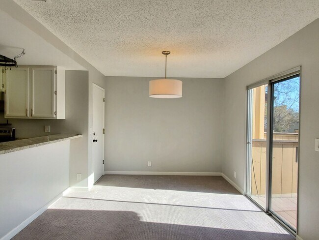 Building Photo - Upstairs Condo with 2 Car Garage, Fresh Pa...