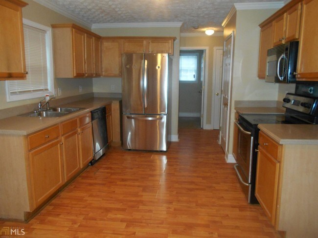 Foto del edificio - 6037 Fairington Farms Ln