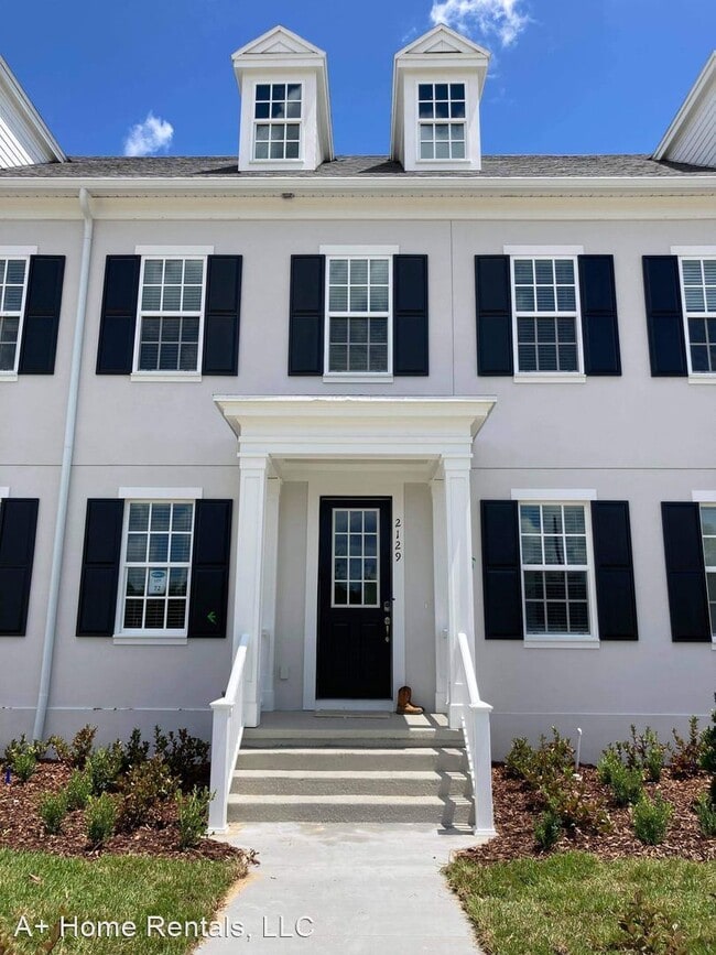 Building Photo - 3 br, 2.5 bath House - 2129 Celebration Blvd.