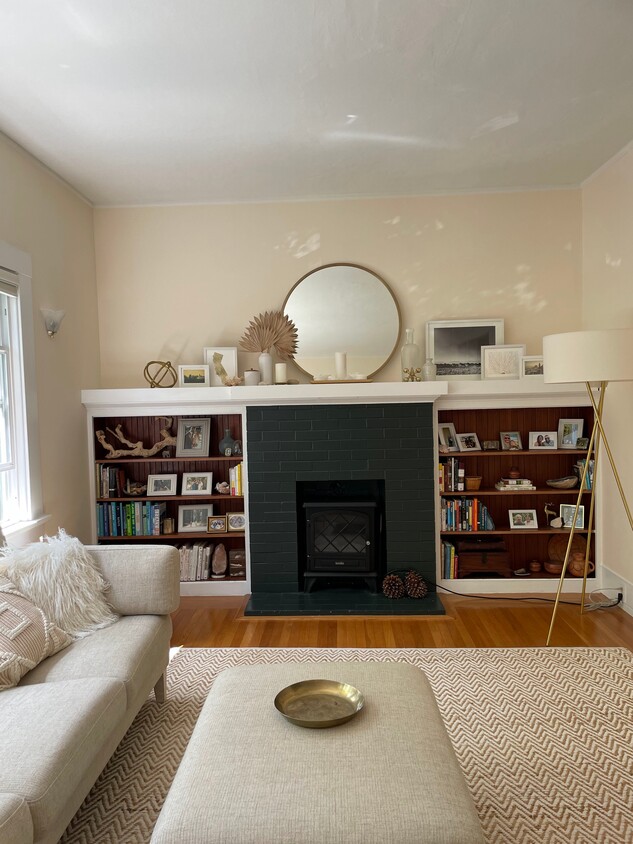 Living room fireplace with electric warming heater - 5917 Chabot Rd