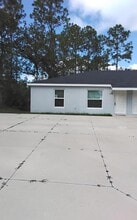 Building Photo - 9426 N Manashee Dr