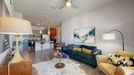 Located at 1507 Mission Rd, this single-story 2-bedroom, 1-bathroom home offers a thoughtfully designed open-concept layout with wood-style flooring throughout. The living room is bright and airy, featuring soaring ceilings, a ceiling fan, and large windows that invite natural light, creating a welcoming atmosphere. The space flows seamlessly into the kitchen, which is equipped with granite countertops, sleek gray cabinetry, a subway tile backsplash, stainless steel appliances, and a pantry for added storage. A breakfast bar provides casual dining options. The primary bedroom is a comfortable retreat highlighted by a bold teal accent wall, generous natural light from large windows, and a dedicated closet. The second bedroom is equally well-sized with its own closet. The full bathroom features granite countertops, gray cabinetry, a walk-in shower, and a separate tub-shower combination. Additional conveniences include an in-unit laundry area, multiple closets for ample storage, and connecting hallways that keep the layout functional. The private patio extends the living space outdoors, offering a covered area ideal for relaxation. This home combines modern design with practical features throughout.