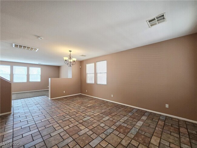 Building Photo - 10865 Wallflower Ave