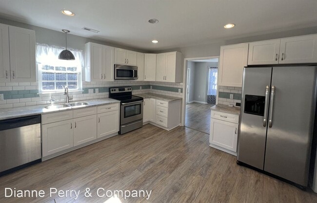 Building Photo - 3 br, 2.5 bath House - 4228 Brinkman Drive