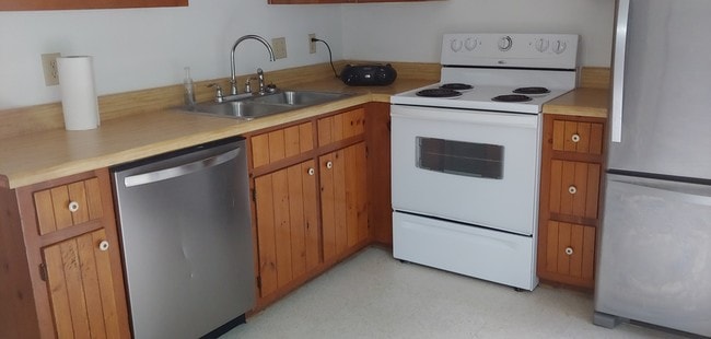Wood cabinetry freshly papered. - 2020 Elmhurst Ln