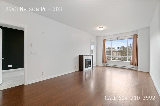 Building Photo - Spacious 1 Bedroom + Den Condo