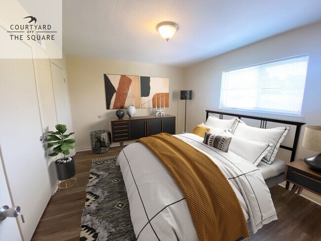 Foto del edificio - Courtyard Off the Square Apartments