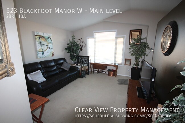 Building Photo - ? All-Inclusive 2-Bedroom Main Floor Suite...