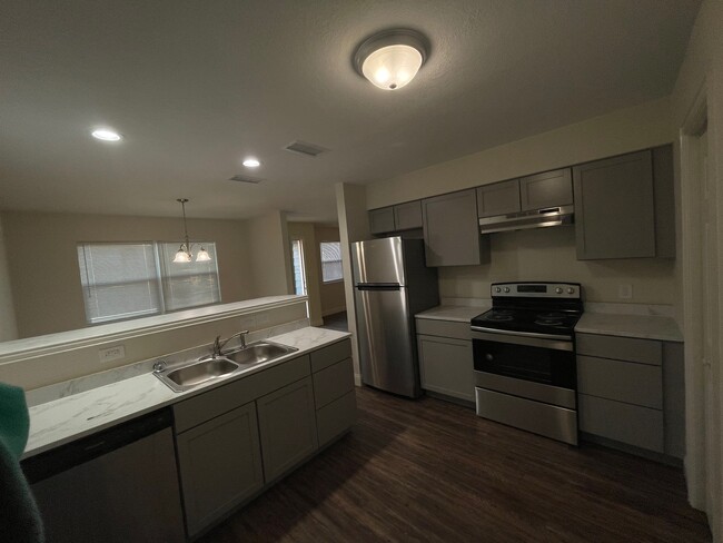 Stainless Steel Appliances in well appointed kitchen - 911 N Weatherford St