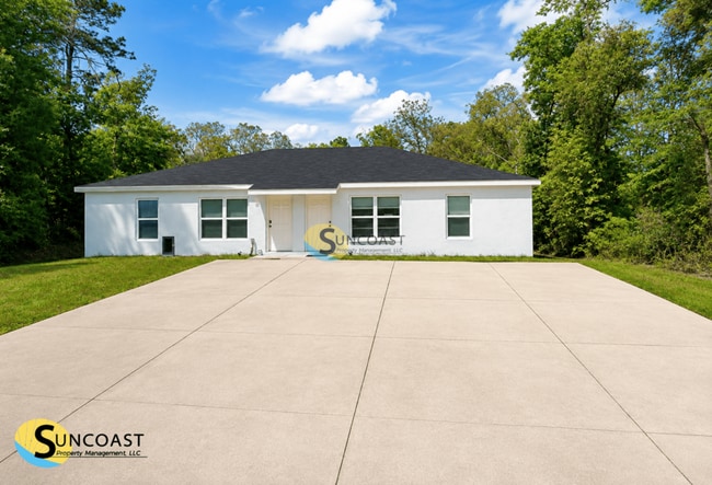 Building Photo - 9106 N Travis Dr