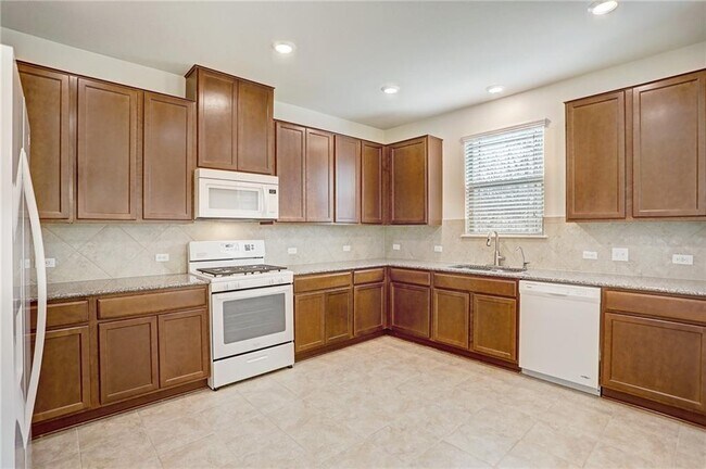 Foto del edificio - 404 Buttercup Creek Blvd