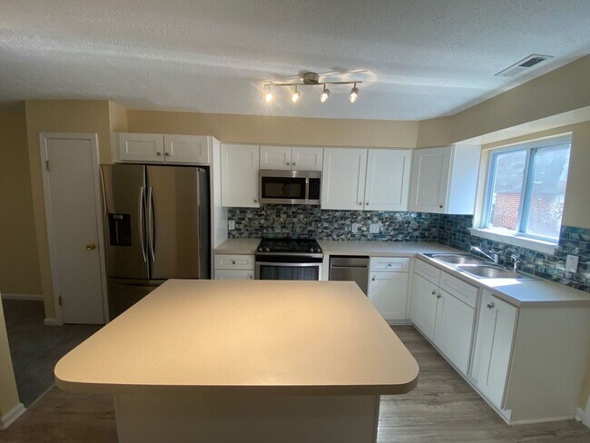 Building Photo - Enjoy coastal living at its finest!  "ASK ...