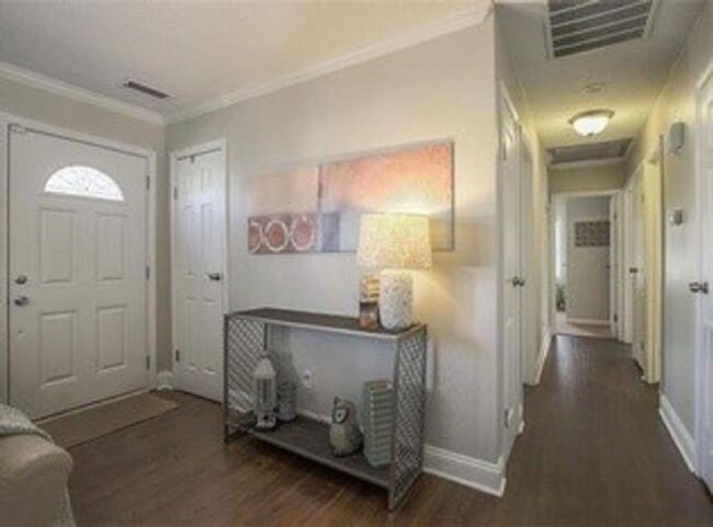 Building Photo - {5611} Updated OP Ranch + Two Car Garage + Fenced Yard and Stamped Concrete Patio Perfect for Spr...