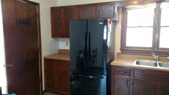 Kitchen with door to side porch - 210 Madison Rd