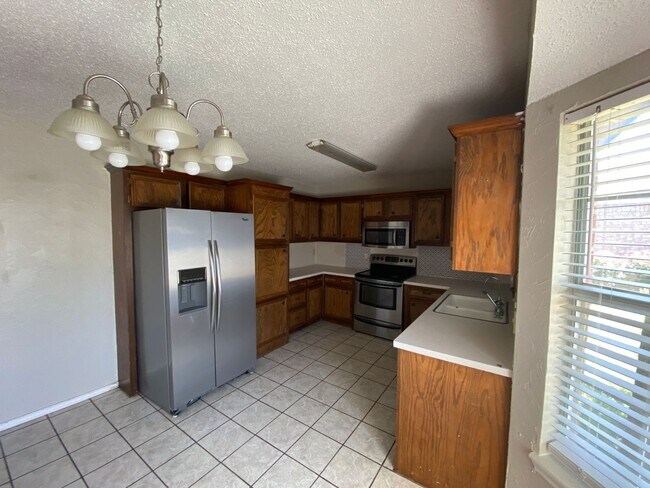 Building Photo - Beautiful recently remodeled 4 Bedroom 2 B...